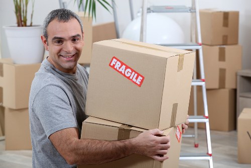 Professional movers packing a house in Manandvan West London