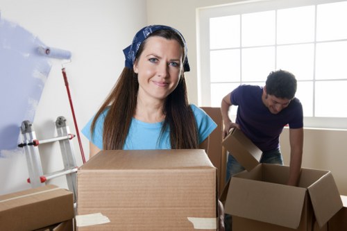 Office workers planning a commercial move with checklists