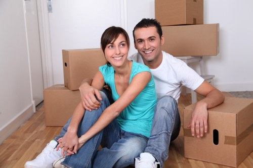 Experienced movers handling office furniture